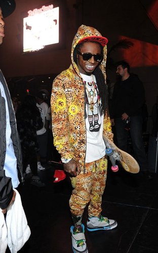 Lil Wayne Continues His Swagless-ness With his Chester Cheetah Outfit While Performing at Gotham Hall Thursday Night