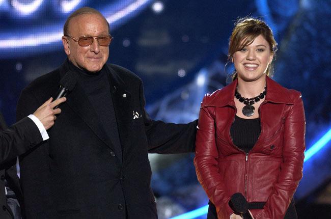 Kelly Clarkson Takes to the Internet and Dishes Dirt on the Real Clive Davis.
