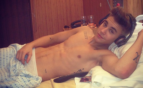 Justin Sends Shirtless Pic From Hospital. Watch Justin Almost Pass Out on Stage! [video]