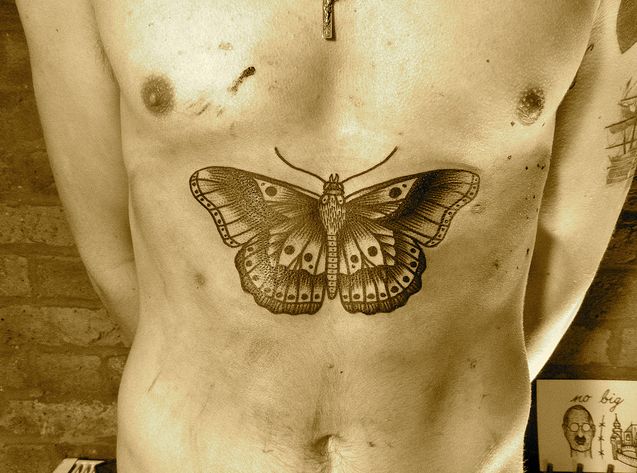 Harry Styles Goes Big!  Picture of Huge Butterfly Tattoo is Confirmed to be his.