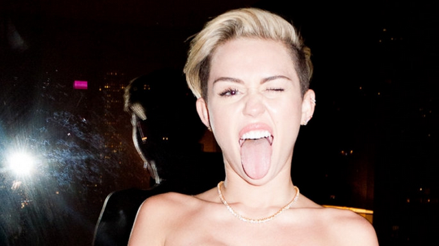 Miley Cyrus Smokes Joint At MTV EMAs, Has Tupac’s Face On Her Butt (VIDEO)