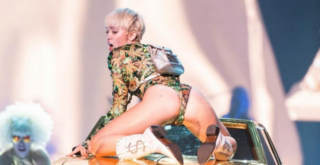 Miley Cyrus Stuffs Fan’s Dirty Underwear Inside Her Mouth (PHOTO)