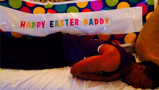 Nick Cannon Shares Old Easter Photo Of Mariah Carey Using Him As Furniture