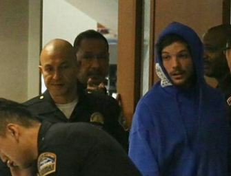 Louis Tomlinson and Girlfriend Scrap With Paparazzi at LAX, Both Tried To Get Away But Tomlinson was Held by Employees and Arrested (FULL FIGHT VIDEO)