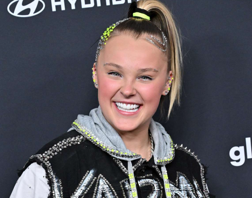 JoJo Siwa Continues To Be Cringe, Shows Off Huge Tattoo Of A Bear With Wings
